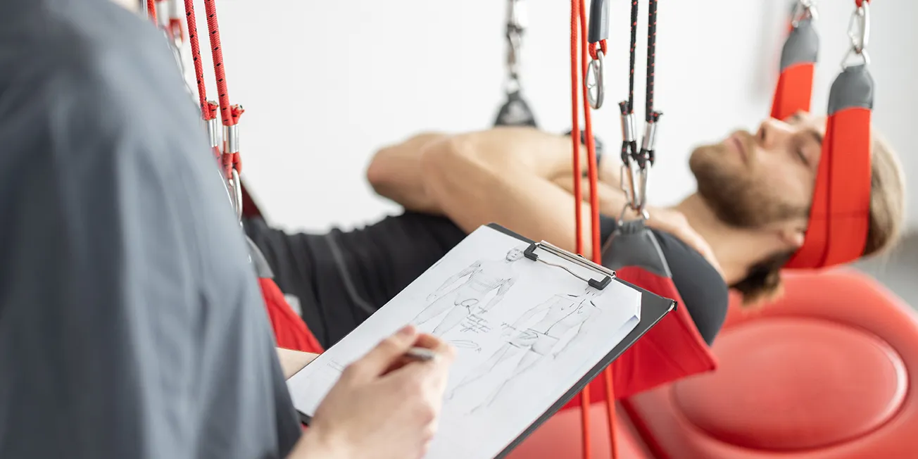 Redcord behandling hos fysioterapeut.